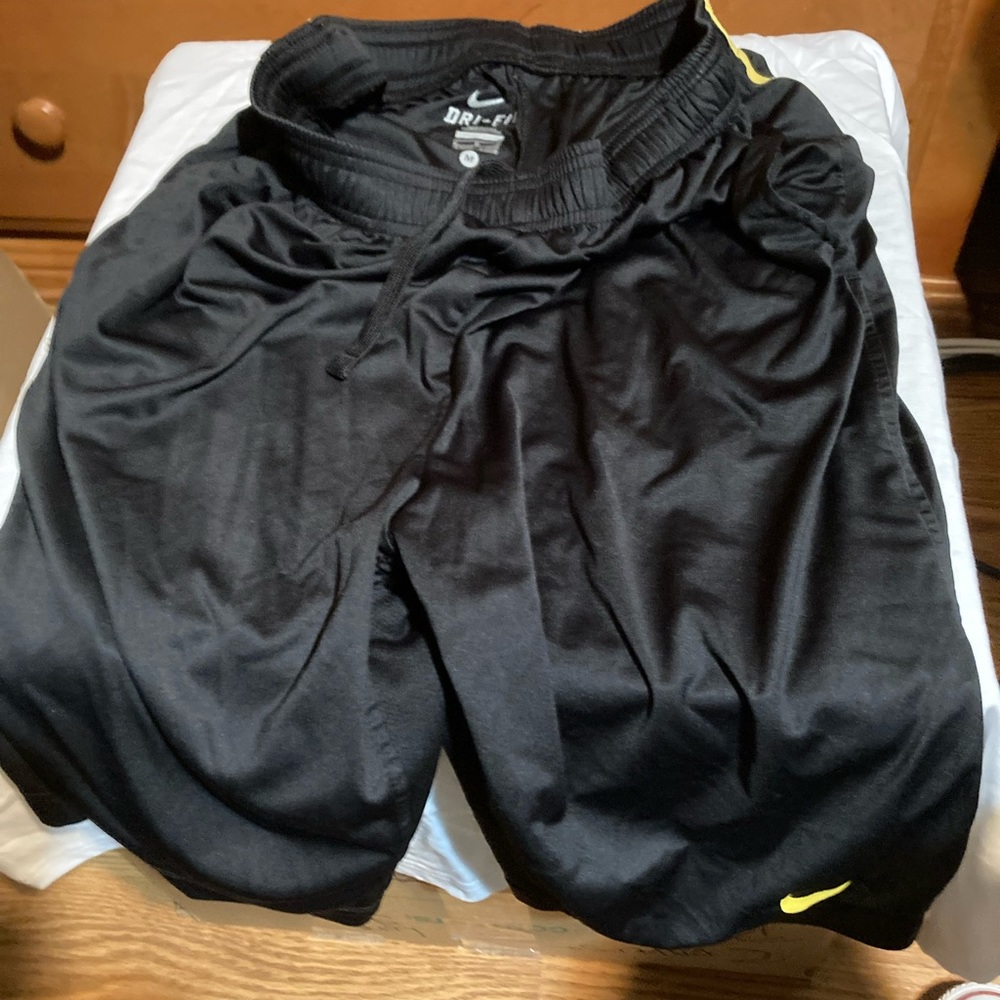 Nike black yellow swoosh basketball shorts